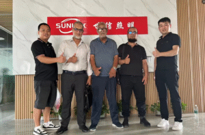 Muslim customer visiting Sunlux LED Lighting China factory to negotiate smart street light order face-to-face